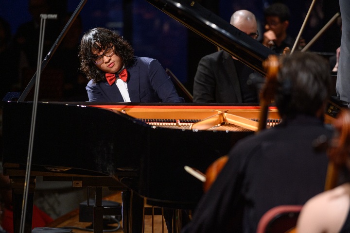 Curtis Phil Hsu – playing the piano